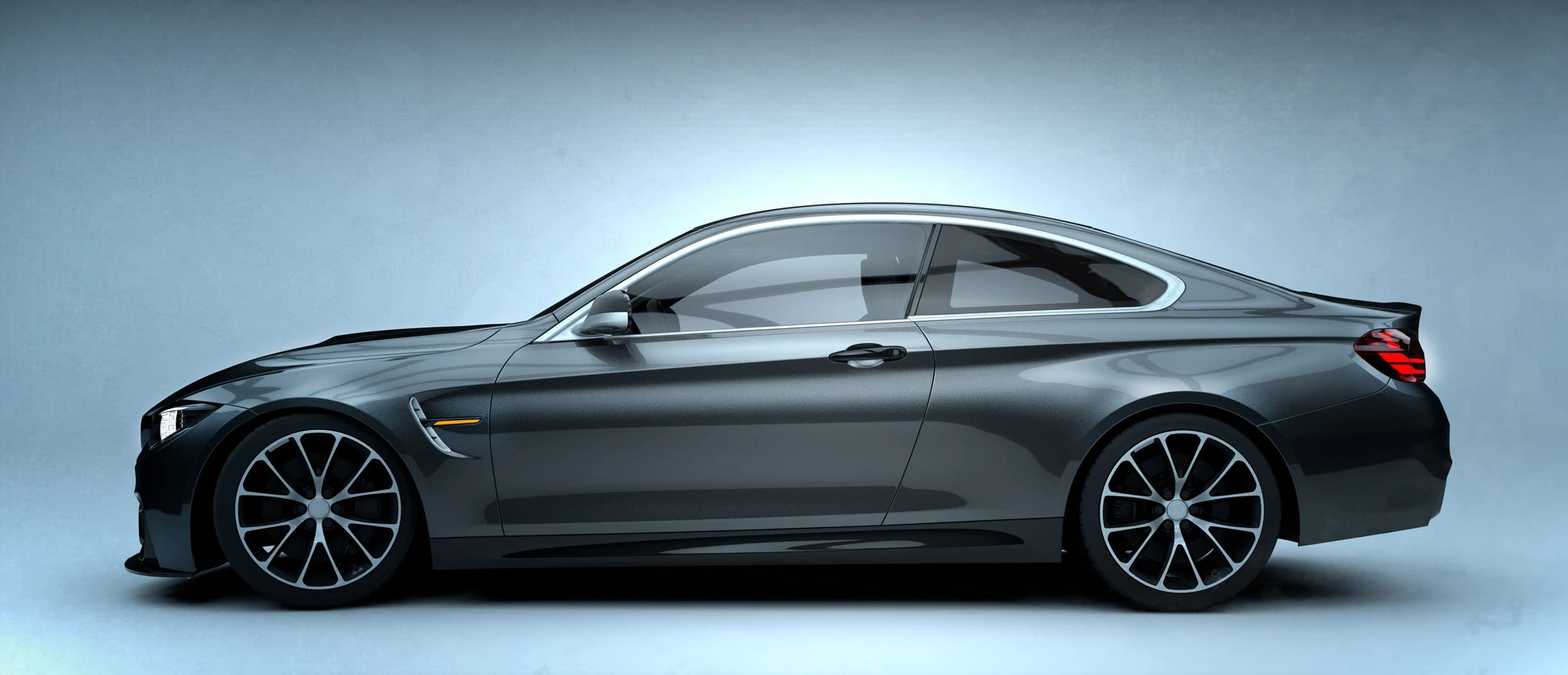 Graues Sportcoupé im Studio mit edler, dezenter Scheibentönung durch HAVERKAMP Ceramic Bond 40 Keramikfolie.